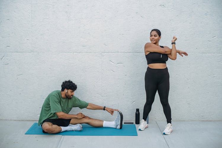 Couple Training Together Outdoors