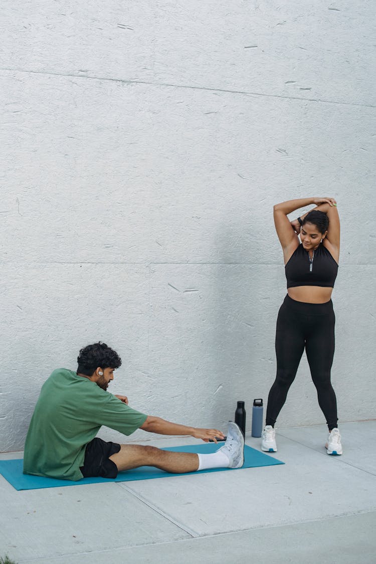 A Man And A Woman Exercising