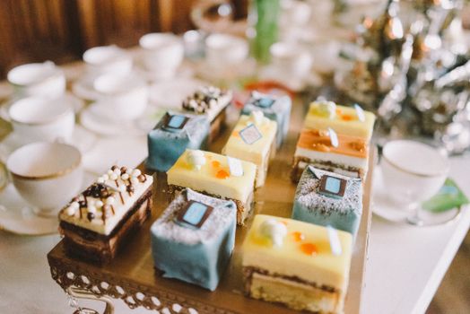 White and Brown Chocolate Bars on Brown Wooden Table