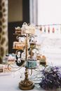 White and Blue Floral Ceramic Mugs on Rack