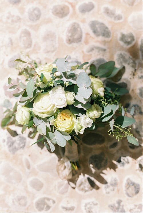 A Bouquet of Flowers with Green Leaves