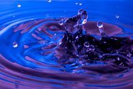Water Drop on Blue Water