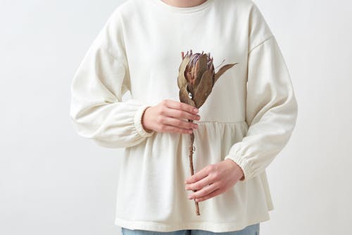 Person Holding Dried Flower