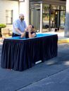 Adult Man Being Baptised in a Pool 