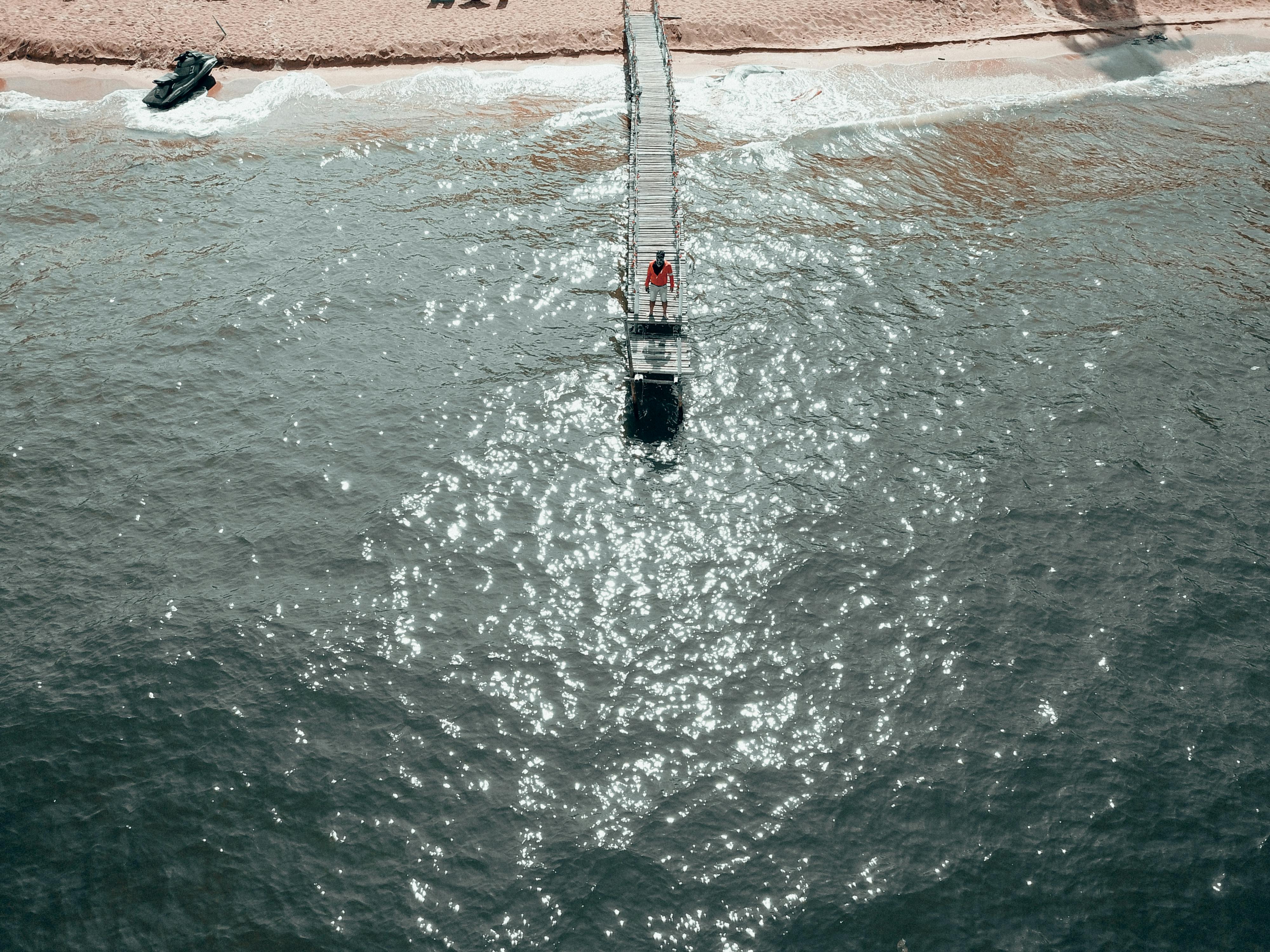 Prescription Goggle Inserts - Aerial shot of a person standing on a pier by the sea in Phu Quoc, Vietnam.