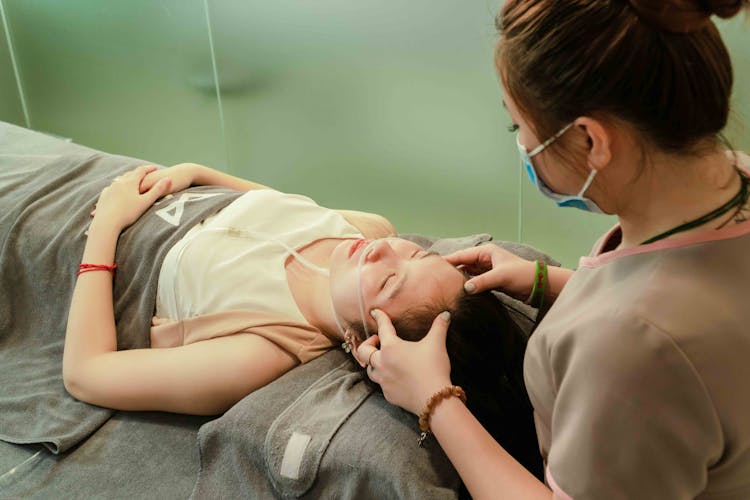 Doctor Examining Patient