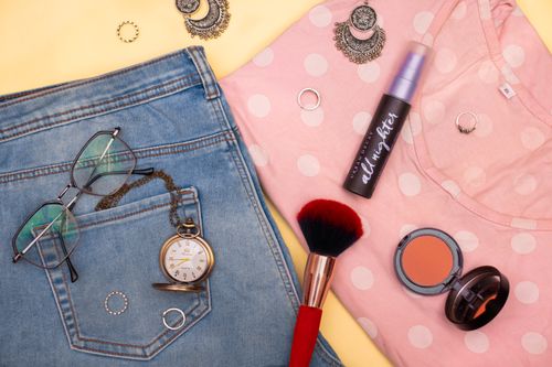 A product flat lay on a plain backdrop — photo by Rezoana Amin Rayna on Pexels