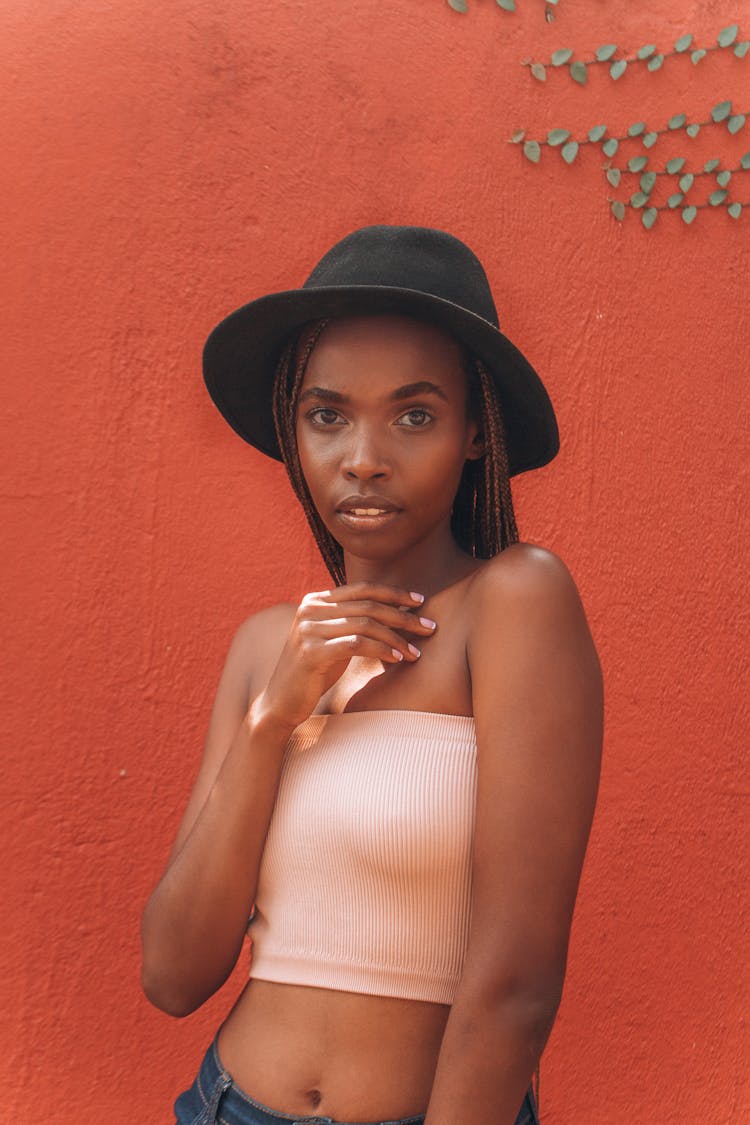 Woman In White Tank Top And Black Hat