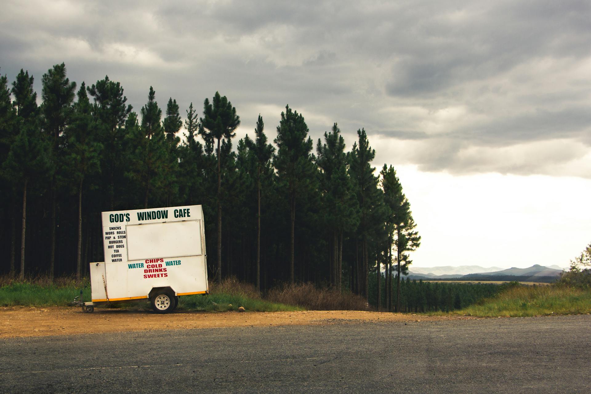Cafe Trailer near Road in Forest