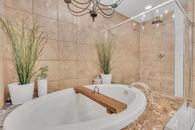 White Ceramic Bathtub With Stainless Steel Faucet