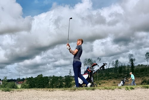 Man in Gray Polo Shirt Golfing