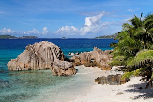 Brown Rock Formations on Sea Shore