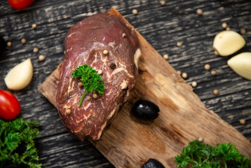 Free Raw Meat on a Cutting Board  Stock Photo