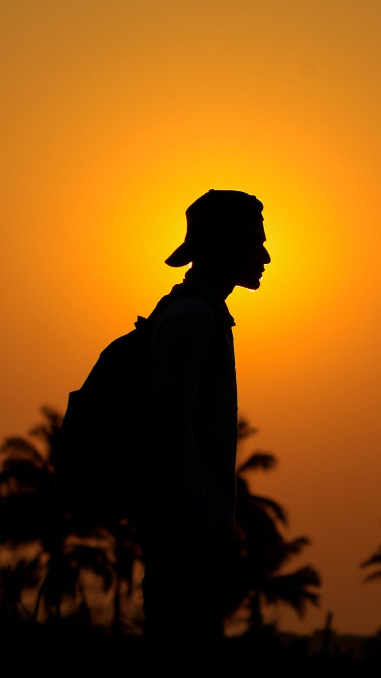 Silhouette Of Backpacker 