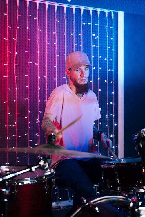 Man Playing Drum Set