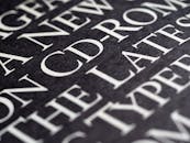 White Letters on Black Paper