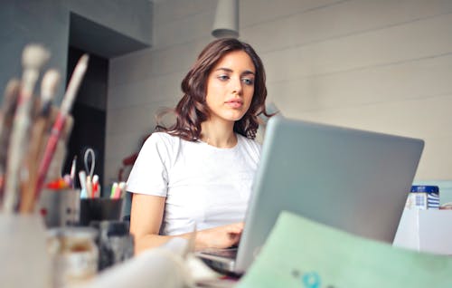 A Woman Using Laptop