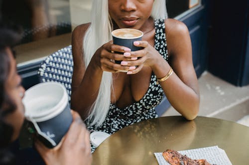 Woman Wearing a Hot Drink