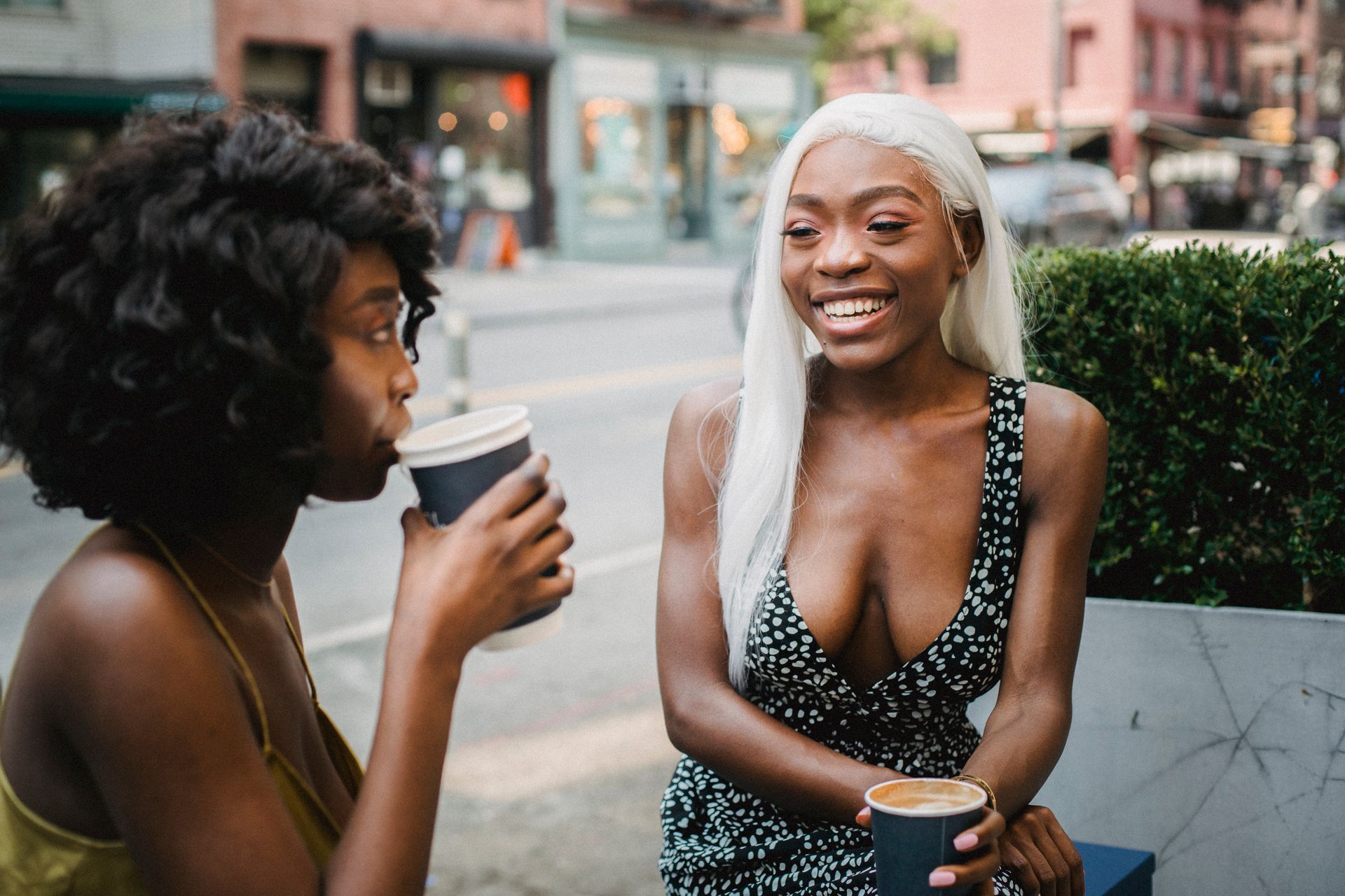 Woman Drinking from a Disposable Cup