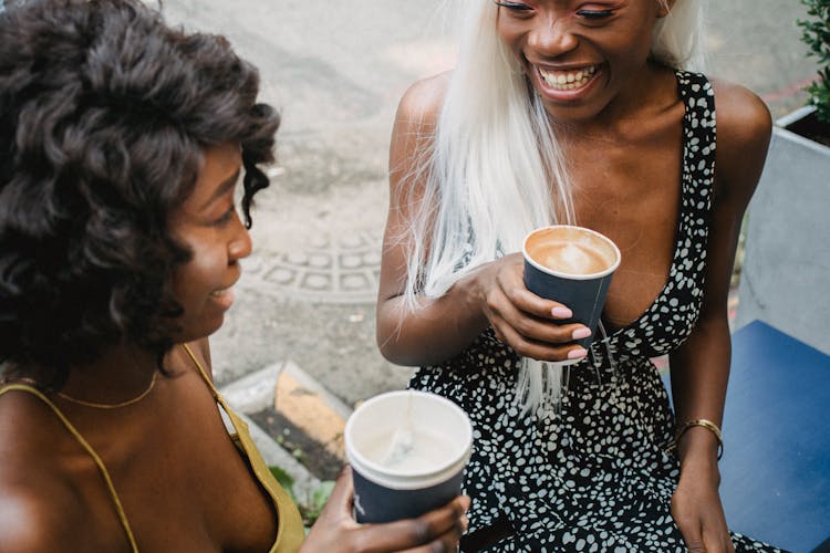 Happy Women Drinking Takeaway Coffee