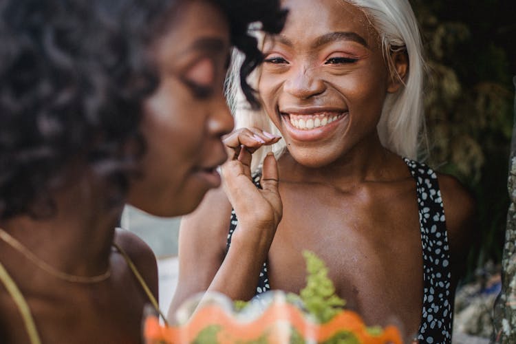 Smiling Woman Talking With Friend