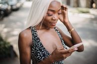 Woman in Black and White Polka Dot Halter Top