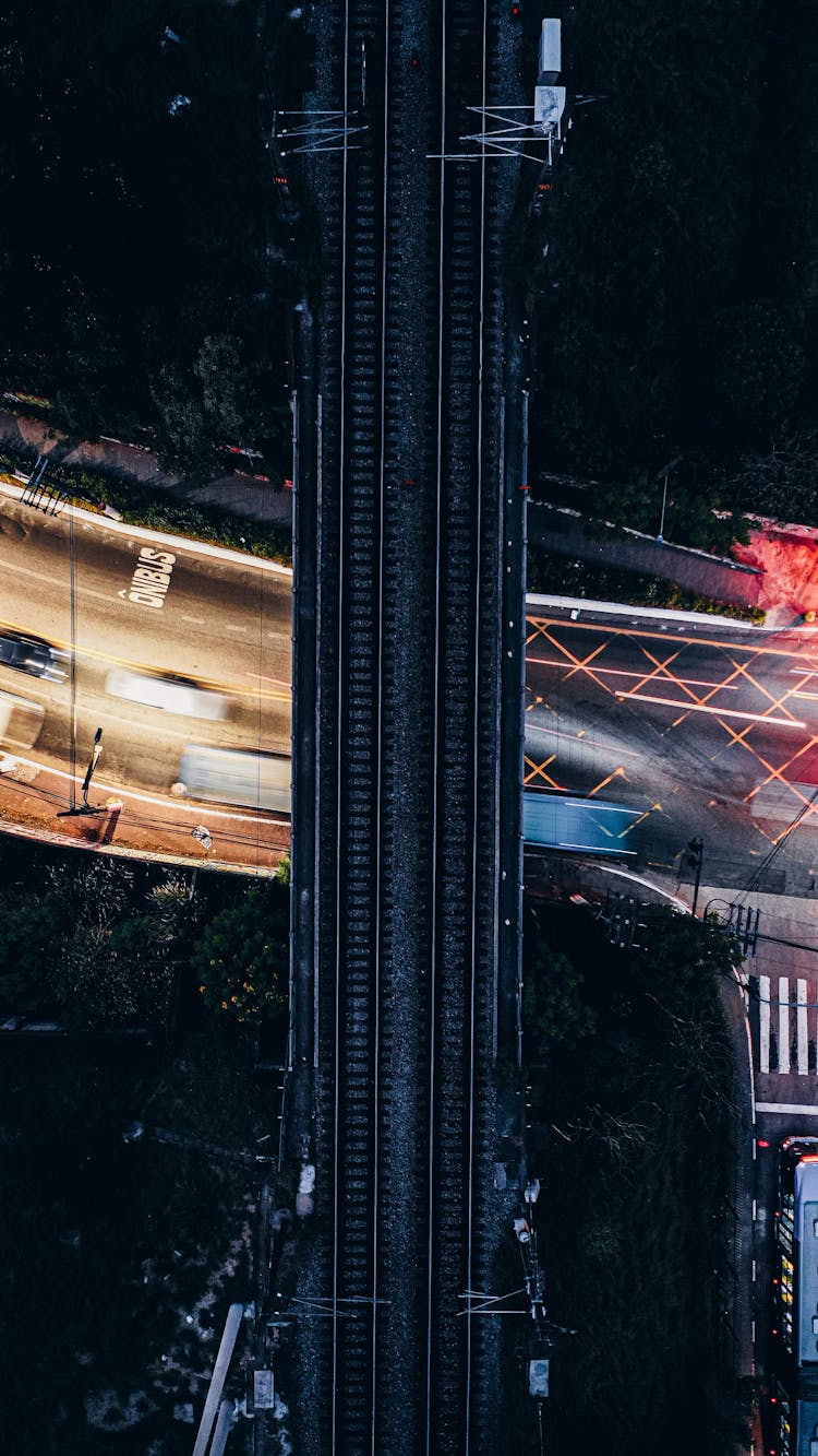 Railway Over Road With Driving Cars