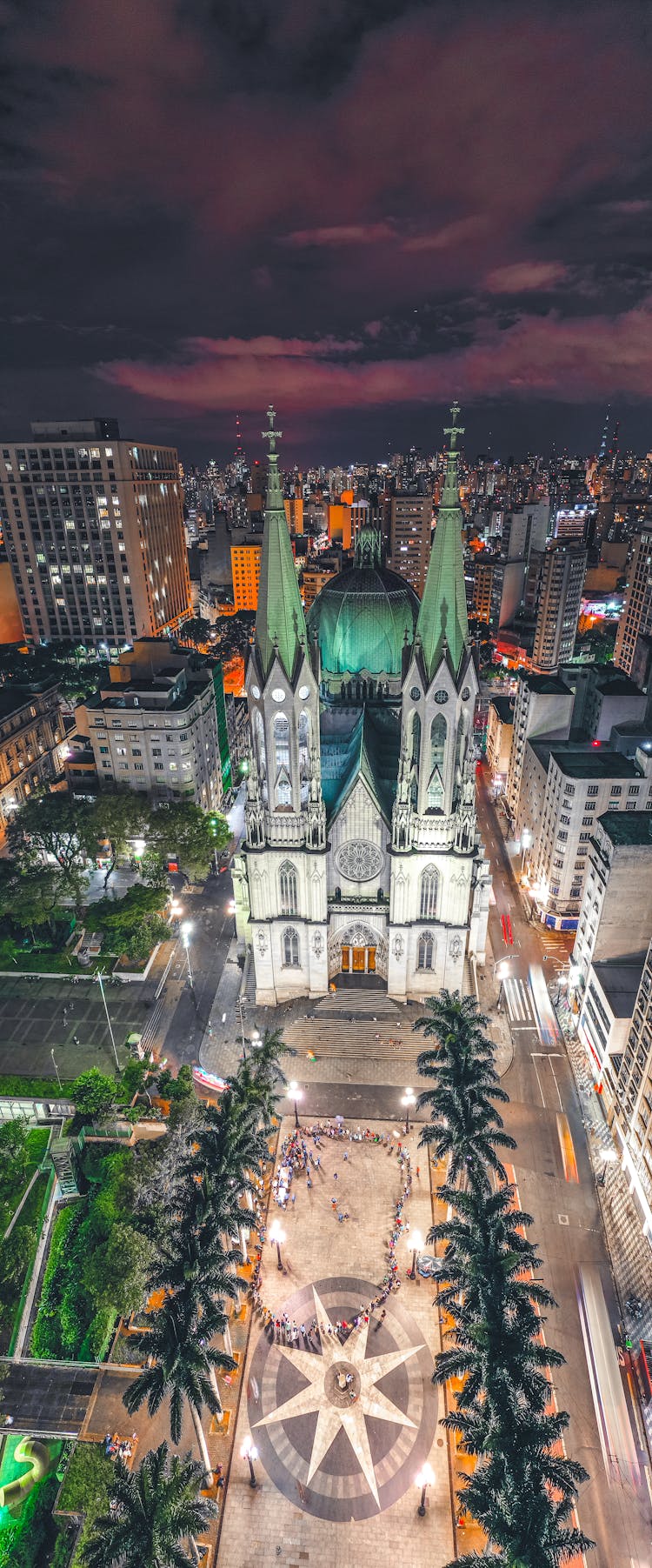 Old Gothic Church Near Modern Buildings In Night City