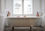Woman in White Bath Tub