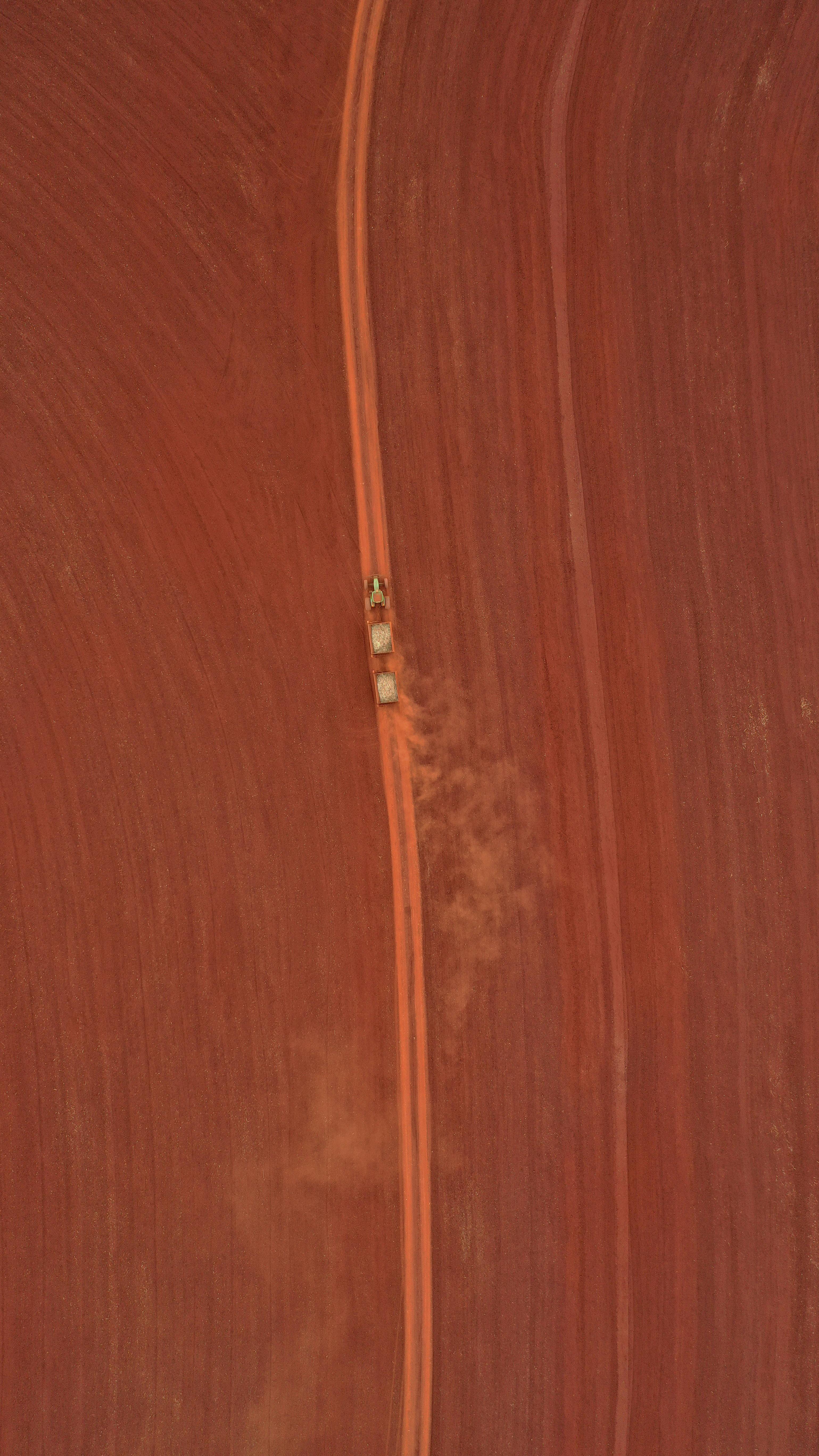 Is wind stronger on land or water?