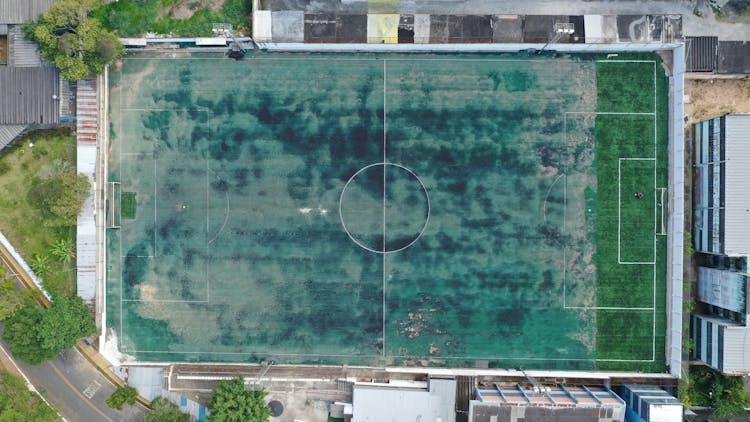 Old Abandoned Green Urban Football Field