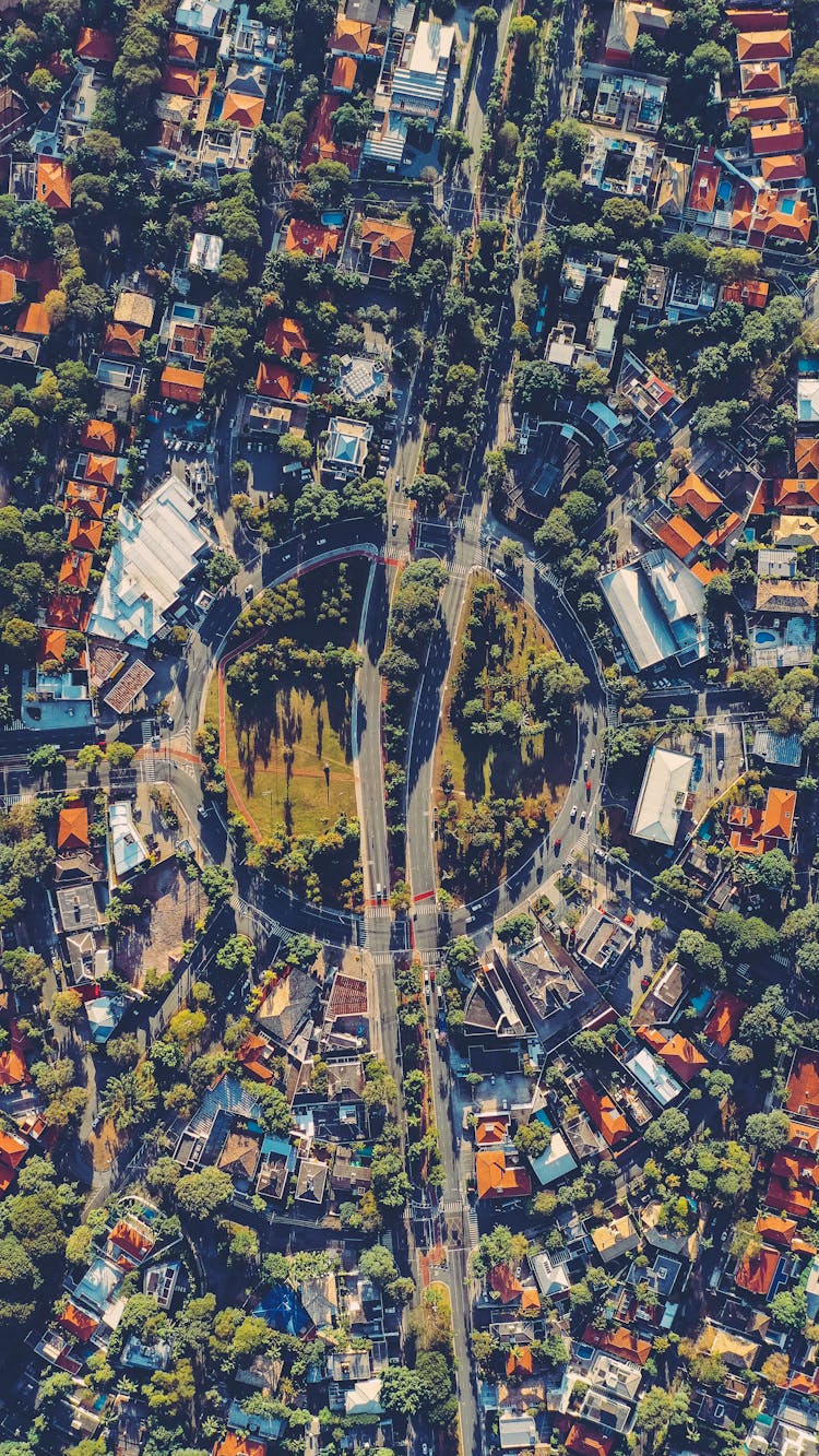 Aerial Residential Houses Surrounding Roundabout Intersection