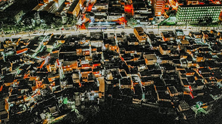 Aerial Congested Residential Area With Illuminated Houses At Night