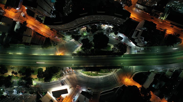 Roads Of Overpass With Streetlights In Megapolis At Night