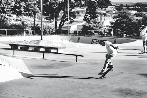 Free Young men riding skateboards in skatepark Stock Photo