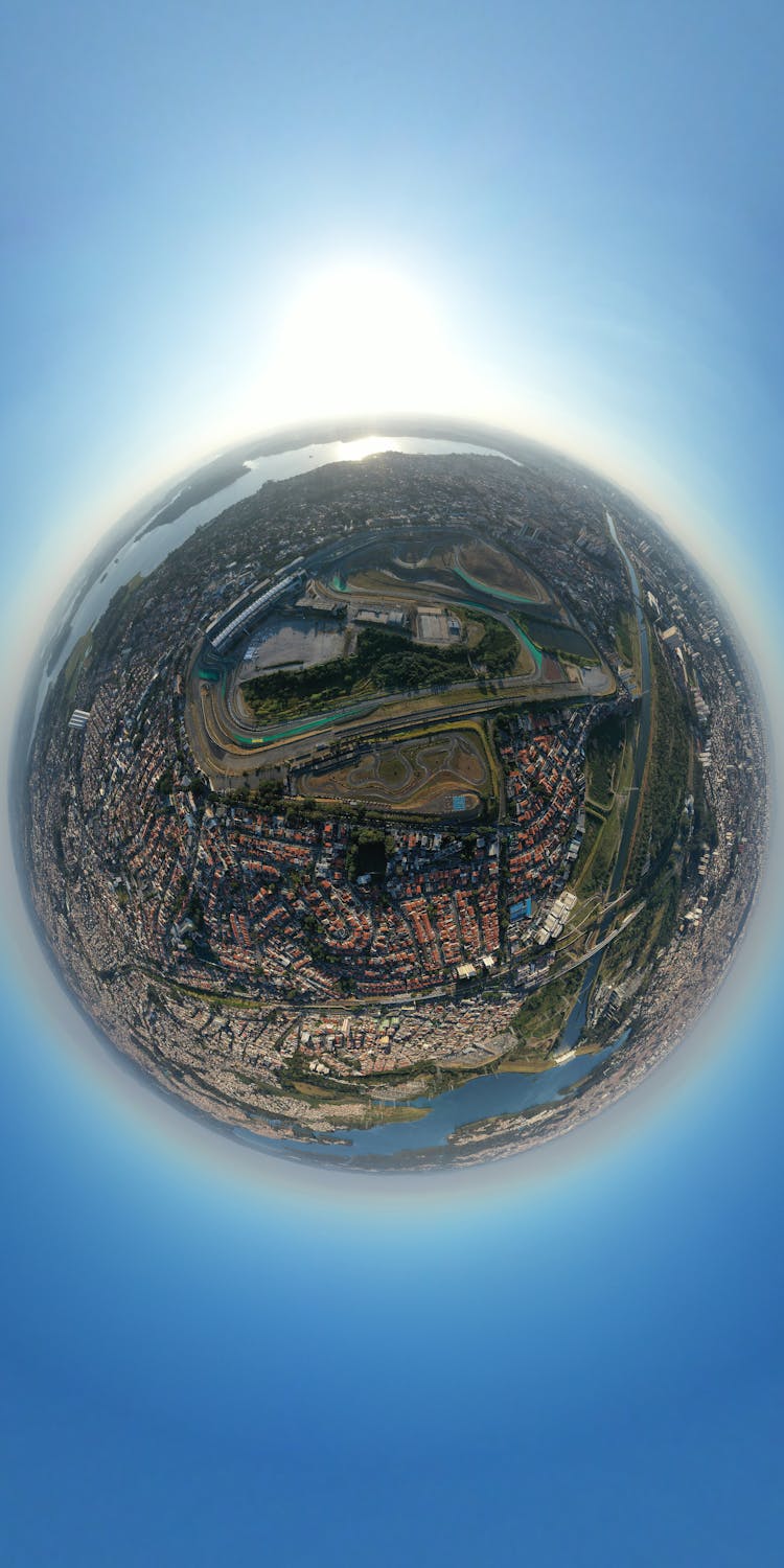 Aerial View Of Cityscape With Race Track