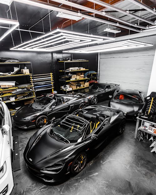 Black Sports Car Parked on Garage 