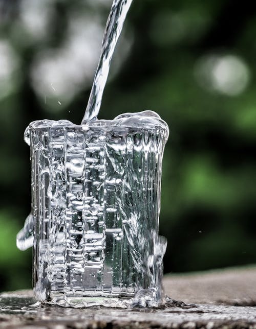 Pouring Water to Glass