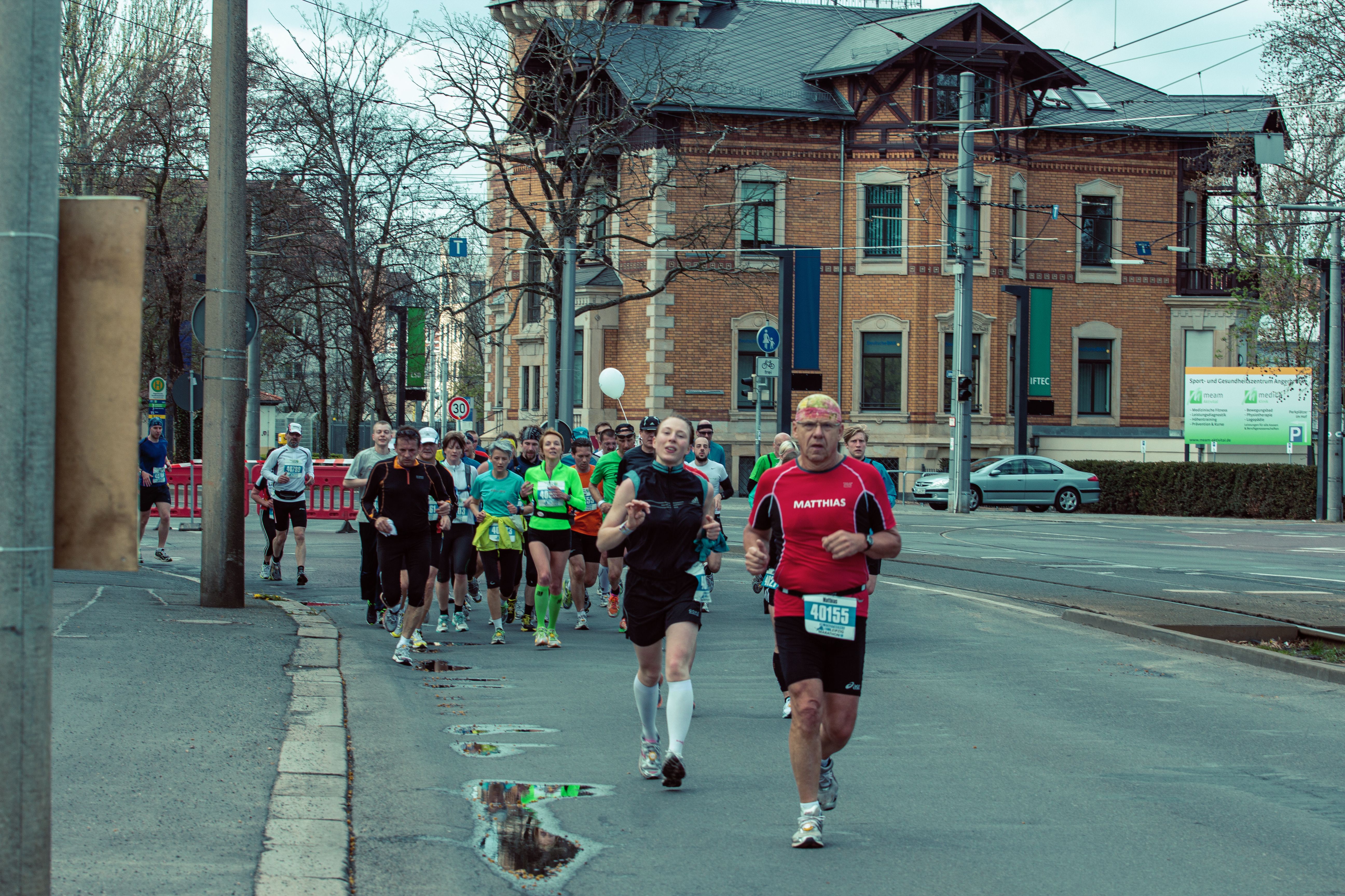 Group of runners participating in an urban race