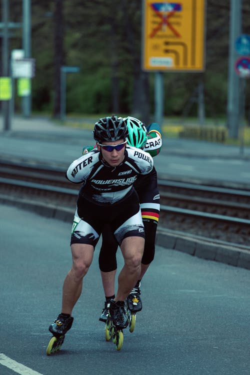 Men Racing on Rollerblade Skates 