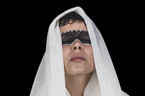 Free Woman Wearing a White Scarf over Her Head Stock Photo