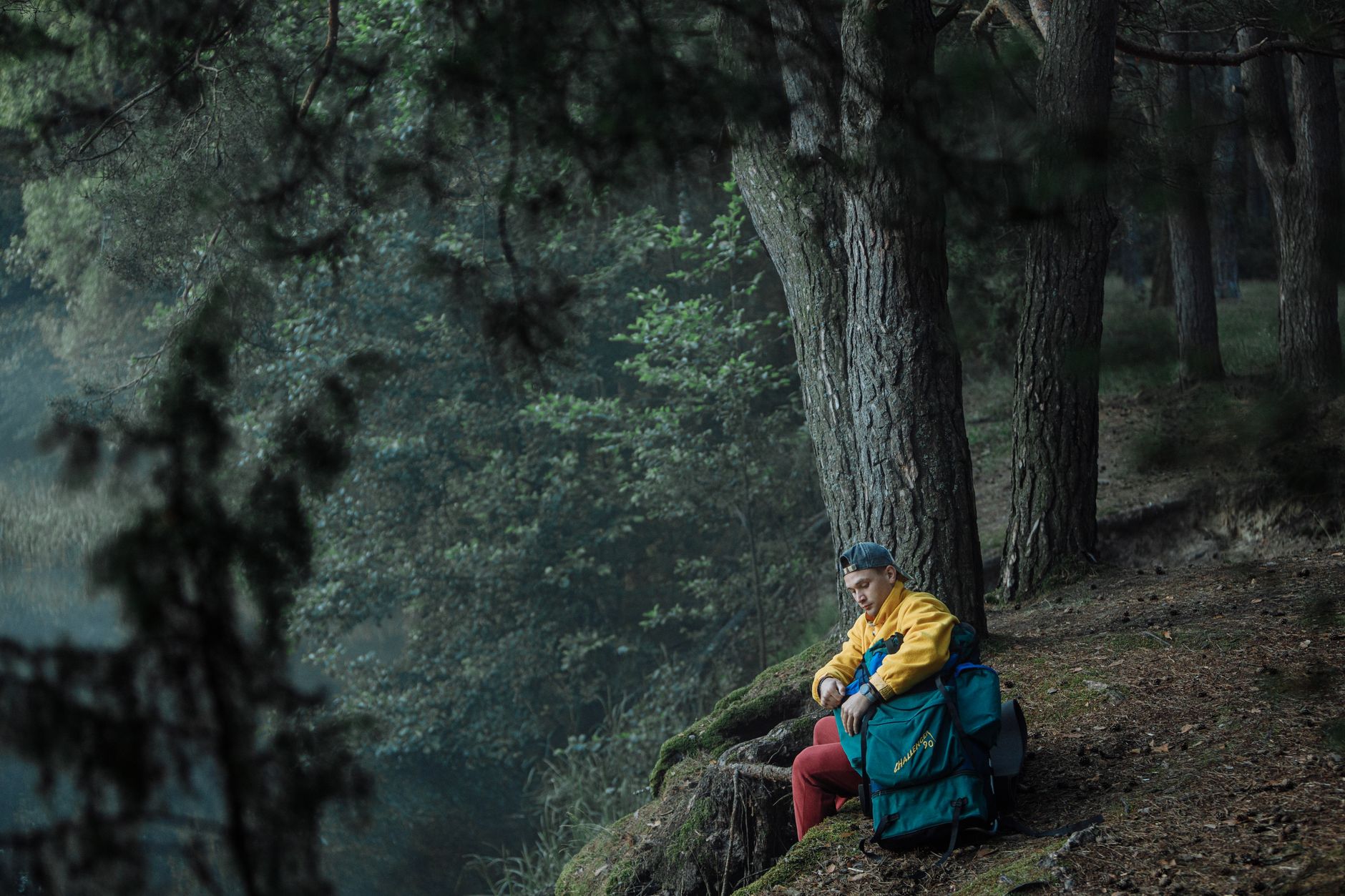 hiker resting sleeping bag trail