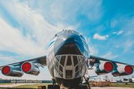 Blue and White Airplane Under Blue Sky