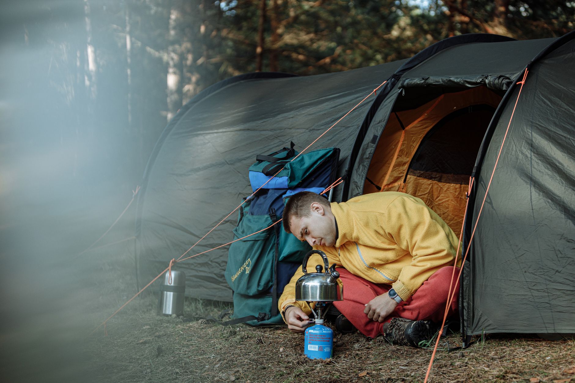 hiker cooking camp stove