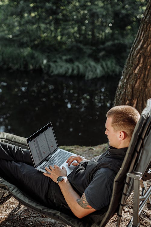 A Man using Laptop