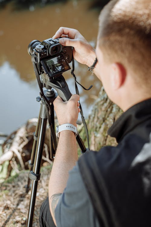 Person Taking Photos Using a Camera