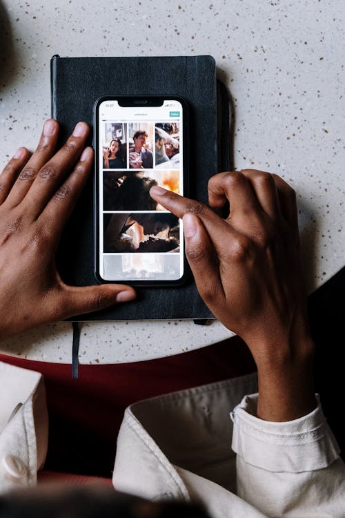 Person Holding Silver Iphone 6