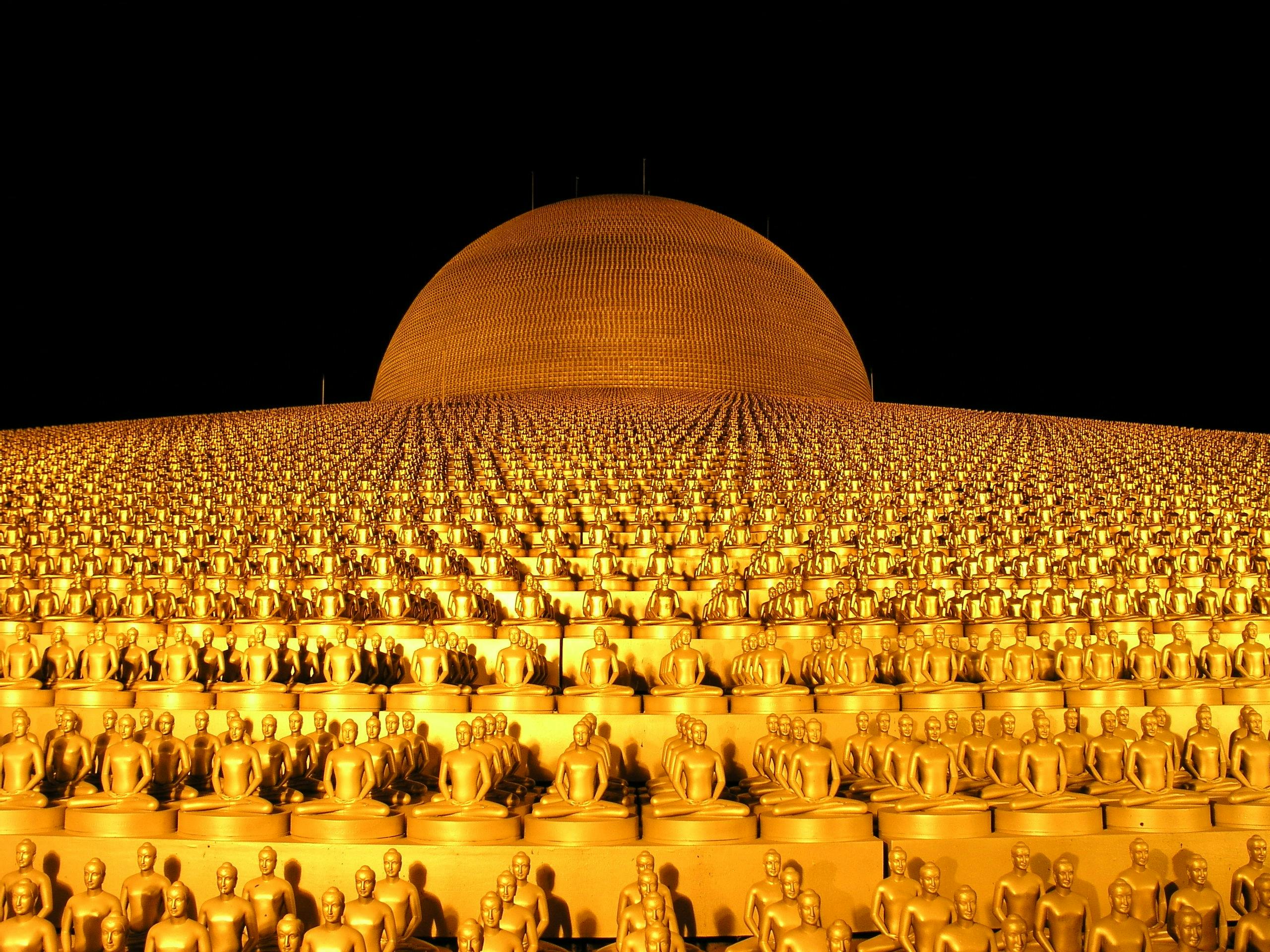 gold colored buddhas dome building