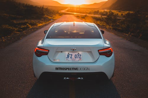 White car on asphalt road