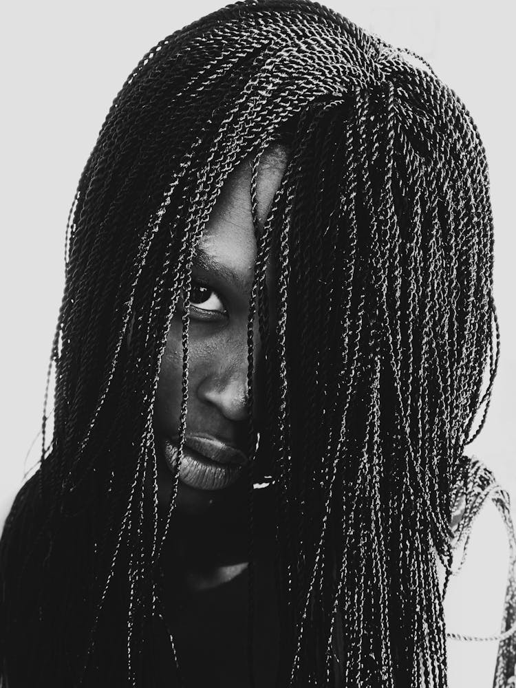 Black Woman With Dreadlocks Looking At Camera